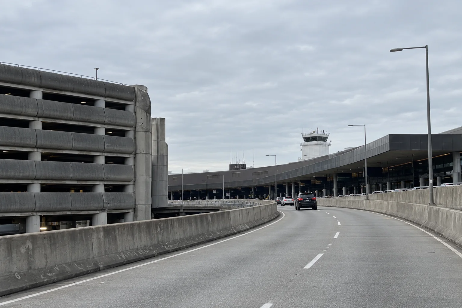 The elevated access roadway curving toward the terminal at Seattle-Tacoma airport.