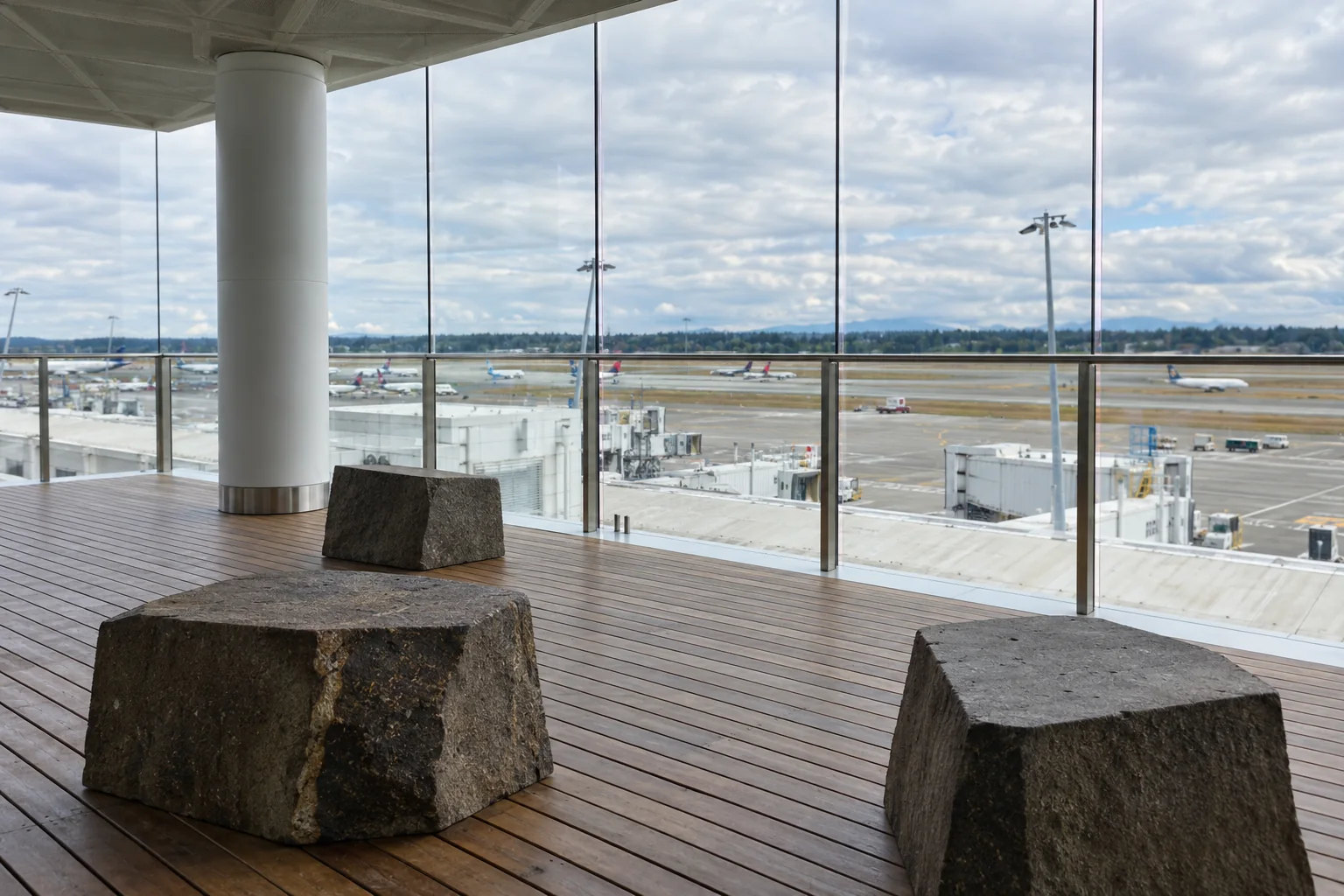 The Lookout deck on the C Concourse at Seattle-Tacoma airport with a glass wall onto the apron.