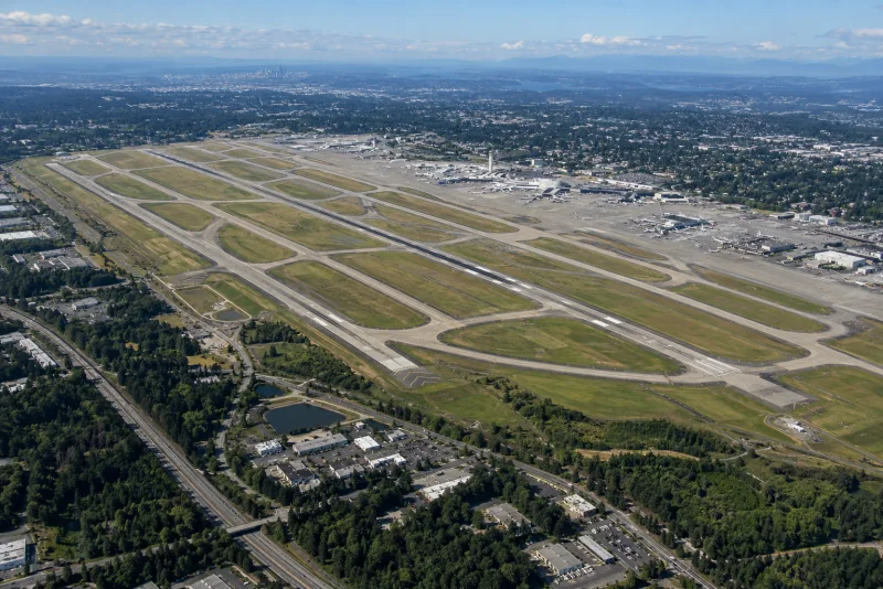 An aerial view of the runways and terminal complex at Seattle-Tacoma airport.