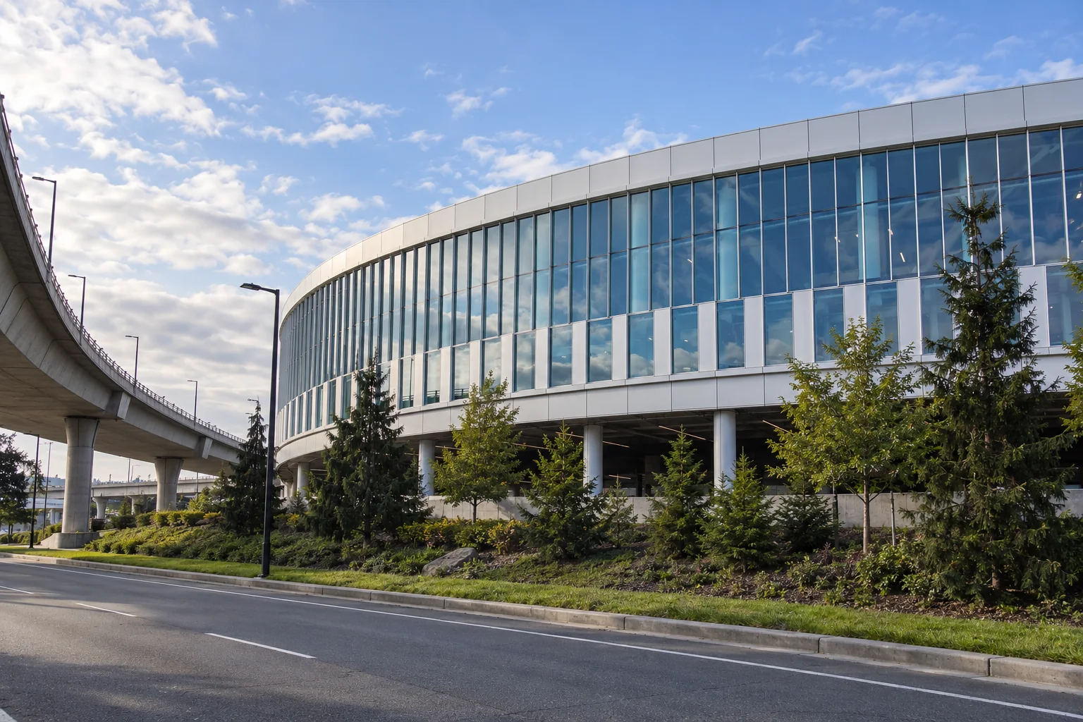 The curved glass front of the International Arrivals Facility at Seattle-Tacoma airport.