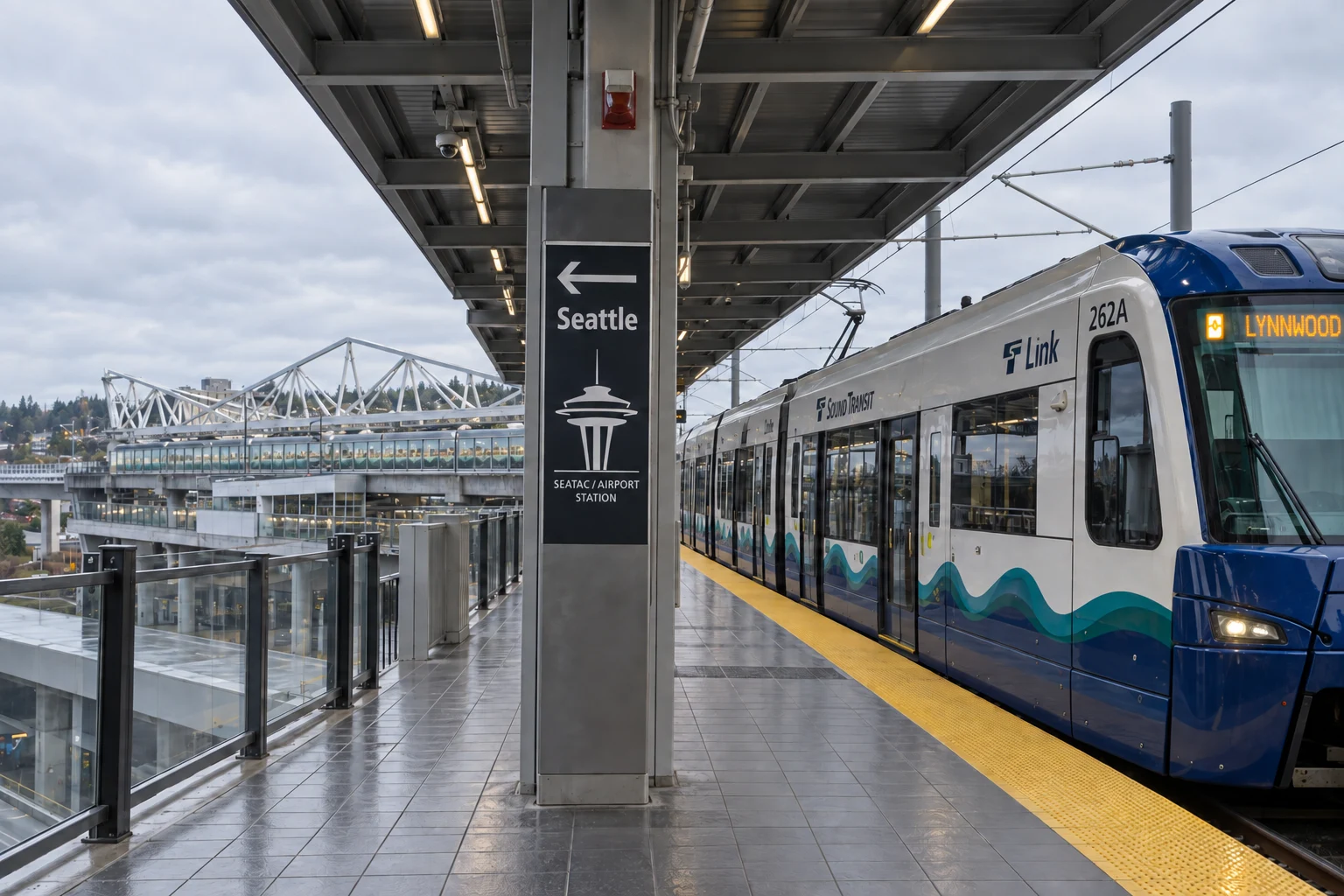 A Sound Transit Link light rail train at SeaTac/Airport station beside Seattle-Tacoma International Airport