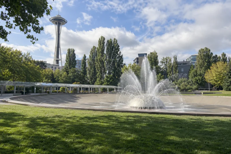 The fountain basin, lawn and Space Needle at Seattle Center in Seattle.